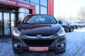 Hyundai IX35 1.6i 4WD * Подгрев отзад * Парктроник * Климатрони - 21490 лв. - 64089138 | Car24.bg