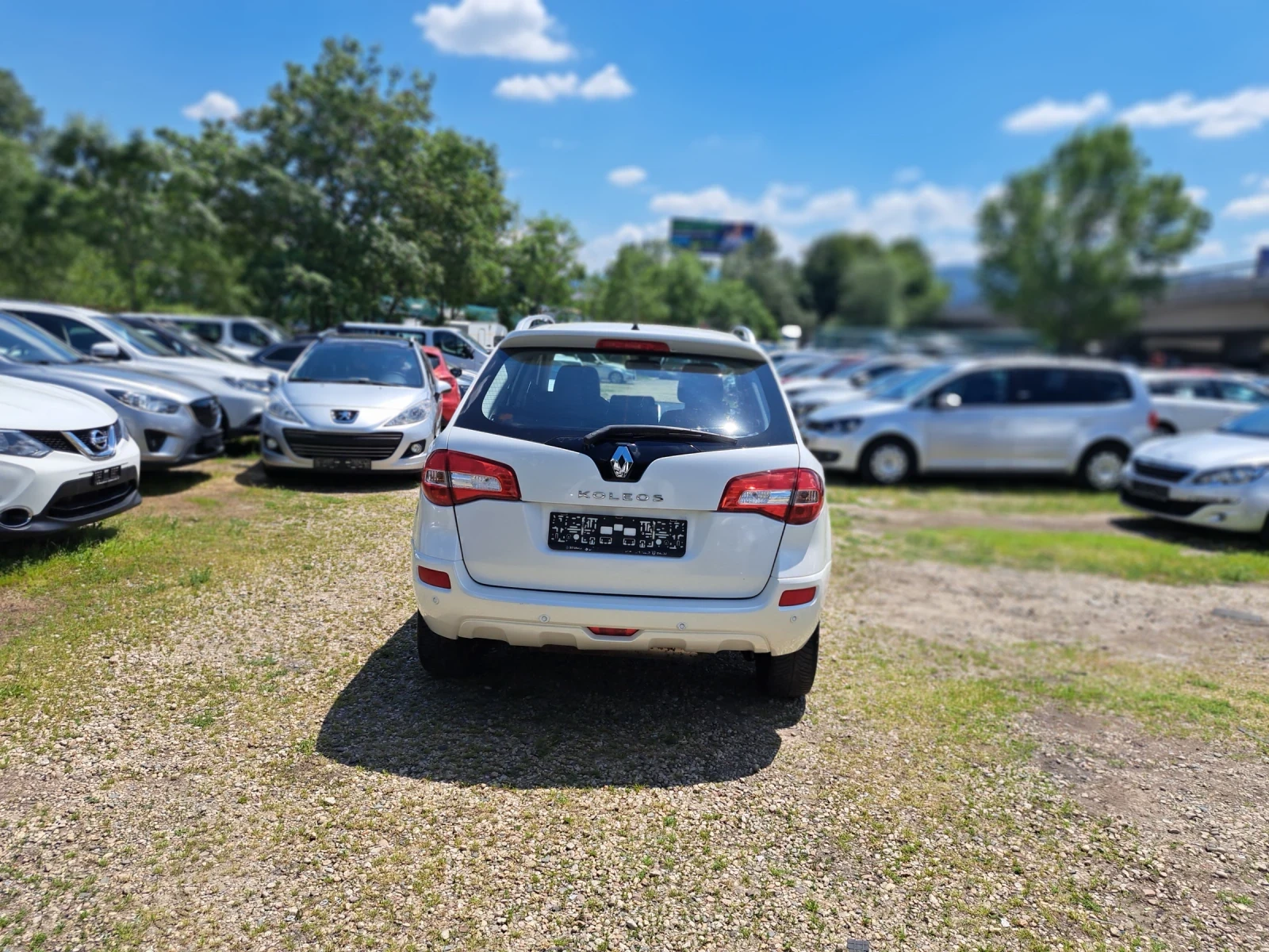 Renault Koleos 2.0 dci 4x4 navi, снимка 4 - Автомобили и джипове - 54682022
