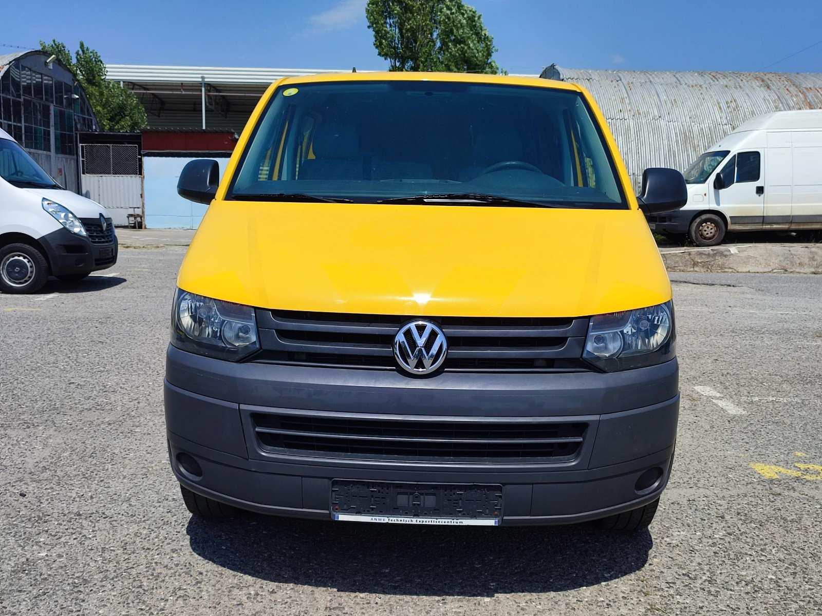 VW Transporter 2.0TDI-102kc-КЛИМАТИК-ПАРКТРОНИК-ТЕГЛИЧ-ЕВРО5 - изображение 2