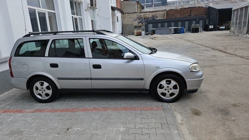 Opel Astra Комби, снимка 1 - Автомобили и джипове - 48991020