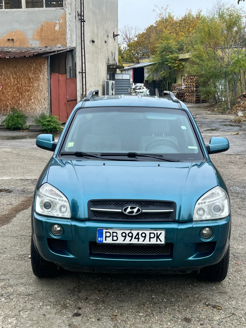 Hyundai Tucson 2.0 CRDI 4x4, снимка 2 - Автомобили и джипове - 52333811