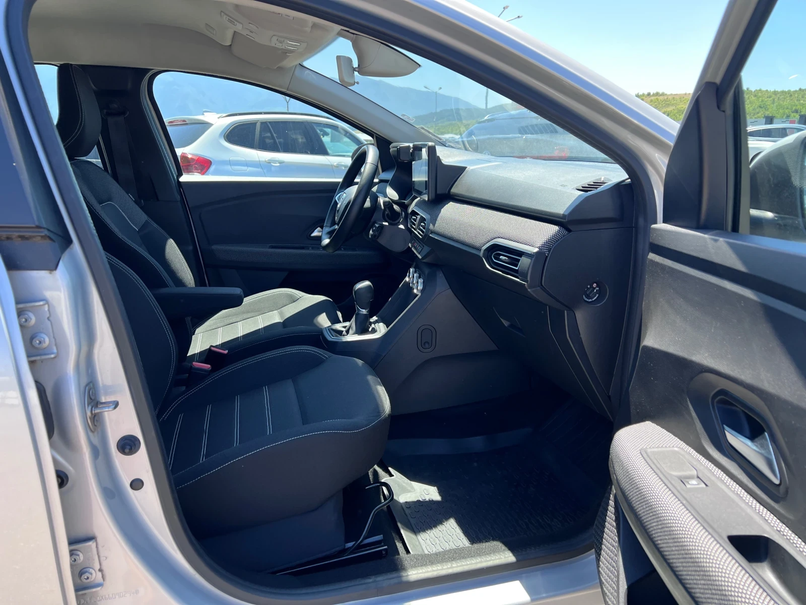Dacia Logan 1.0i, снимка 12 - Автомобили и джипове - 55240467