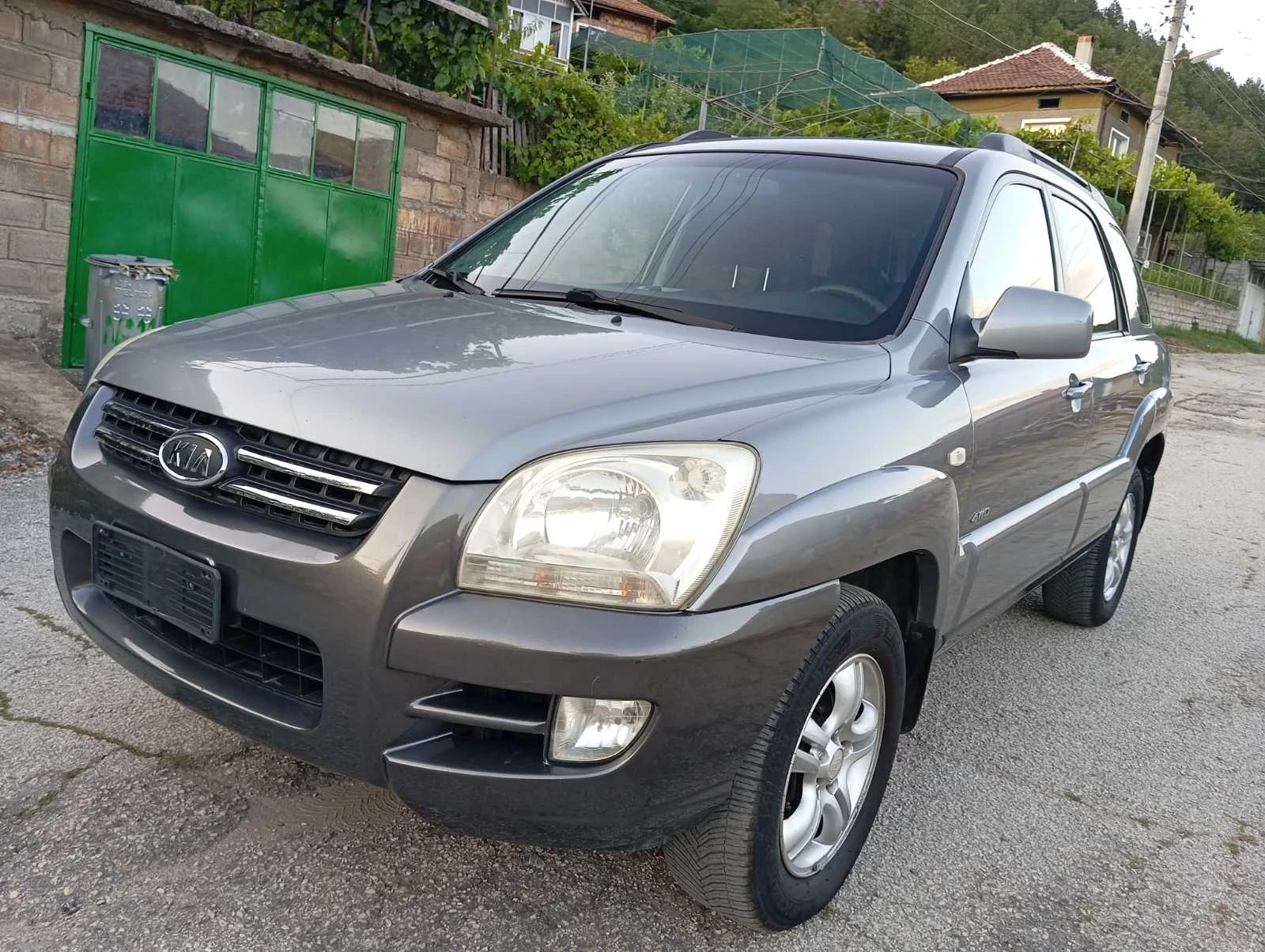 Kia Sportage 2.0i.4x4.Газ.климатик, снимка 7 - Автомобили и джипове - 55450809
