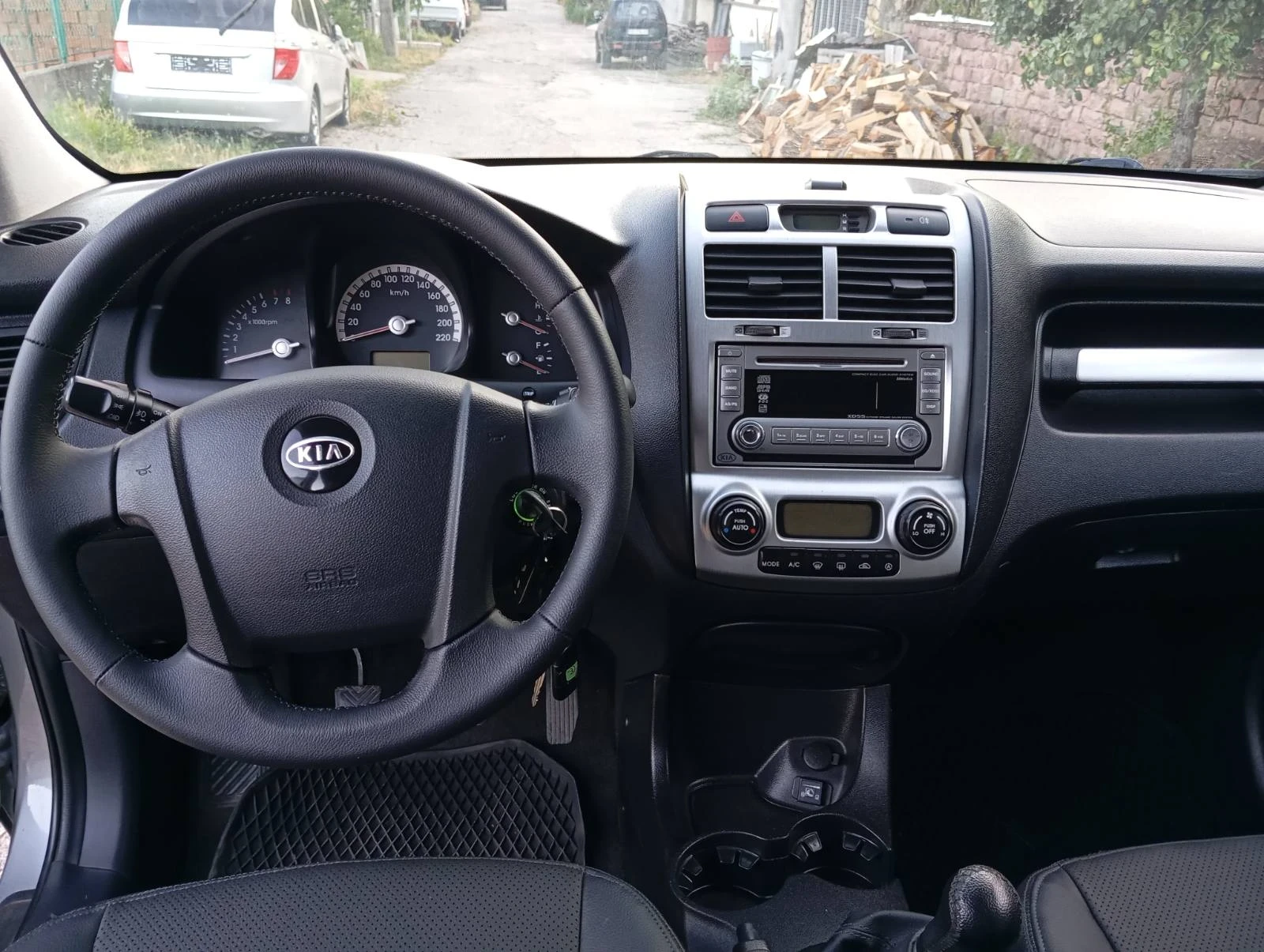 Kia Sportage 2.0i.4x4.Газ.климатик, снимка 9 - Автомобили и джипове - 55450809