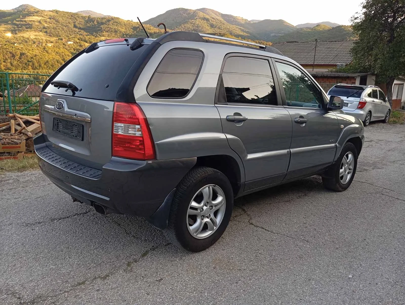 Kia Sportage 2.0i.4x4.Газ.климатик, снимка 5 - Автомобили и джипове - 55450809