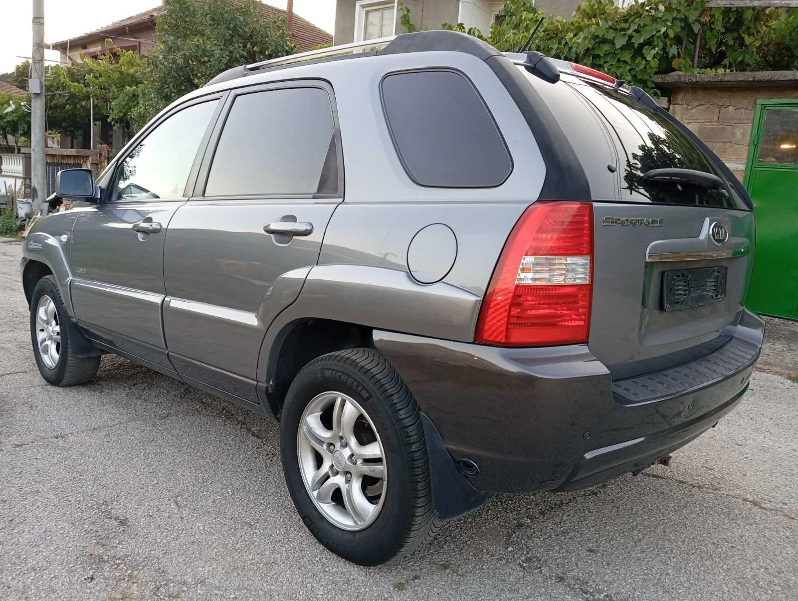 Kia Sportage 2.0i.4x4.Газ.климатик, снимка 6 - Автомобили и джипове - 55450809