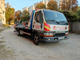 Mitsubishi Canter 2800куб.128 к с  - изображение 1