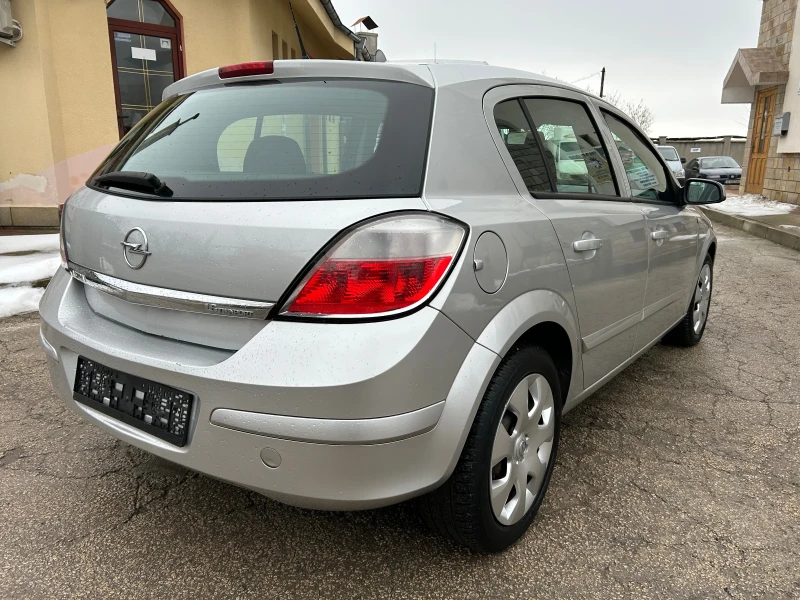 Opel Astra 1.6i EXCLUSIVE , снимка 5 - Автомобили и джипове - 49316911