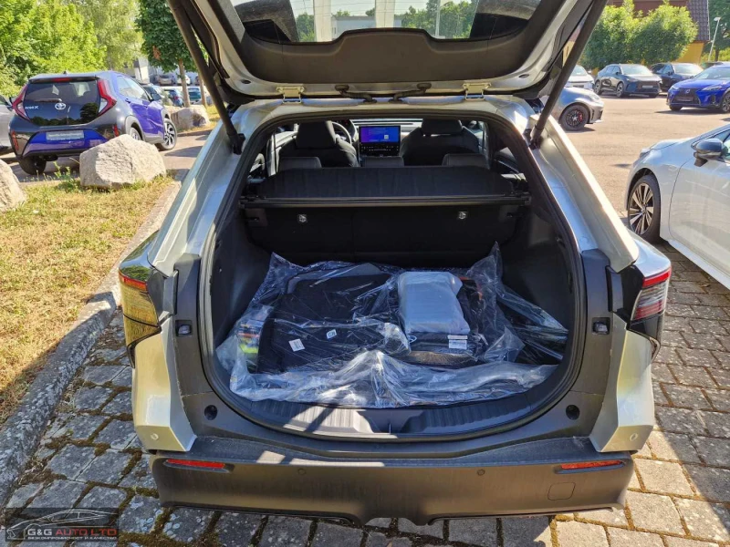 Toyota bZ4X BEV/218HP/LOUNGE/PANO/MEMO/360/JBL/LED/KLESS/525g, снимка 9 - Автомобили и джипове - 52235602