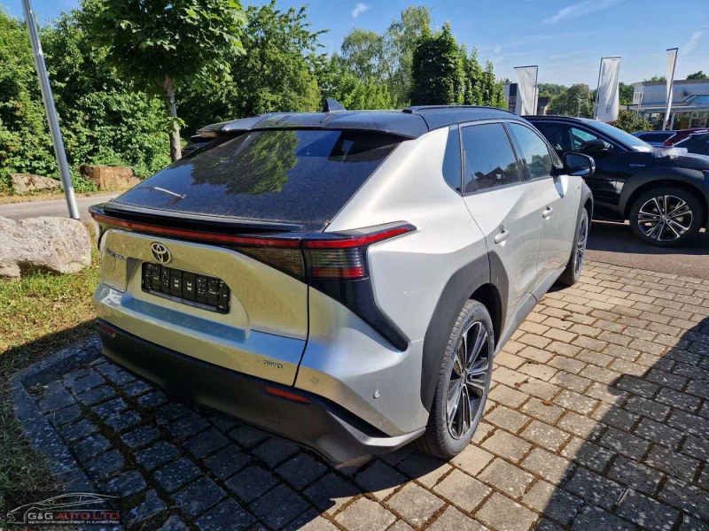 Toyota bZ4X BEV/218HP/LOUNGE/PANO/MEMO/360/JBL/LED/KLESS/525g, снимка 7 - Автомобили и джипове - 52235602