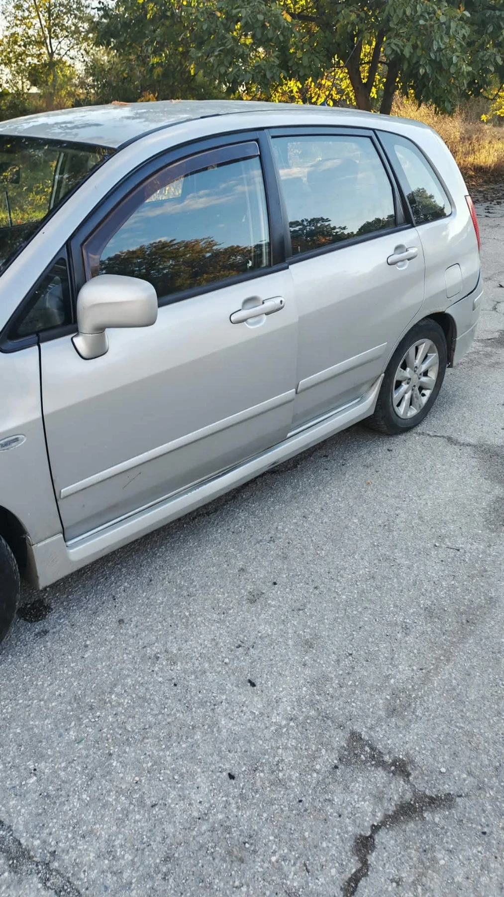 Suzuki Liana 1.6, снимка 11 - Автомобили и джипове - 56627684
