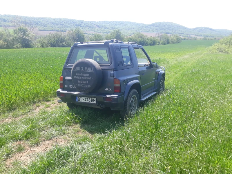 Suzuki Vitara 1.6, снимка 7 - Автомобили и джипове - 52495758