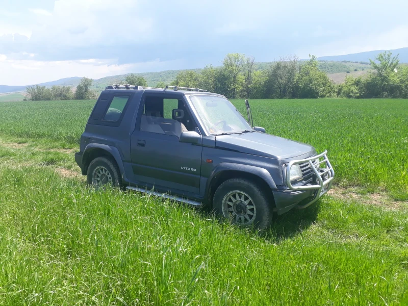Suzuki Vitara 1.6, снимка 11 - Автомобили и джипове - 52495758