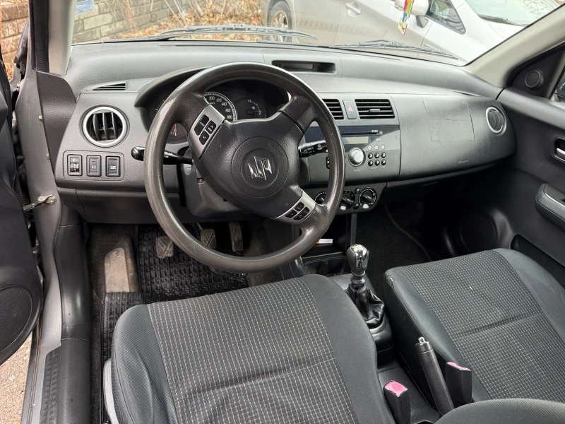 Suzuki Swift 1.3, снимка 9 - Автомобили и джипове - 48310113