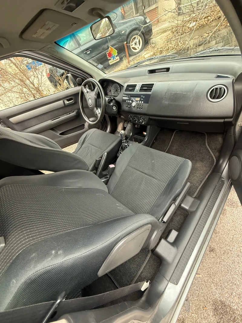 Suzuki Swift 1.3, снимка 12 - Автомобили и джипове - 48310113