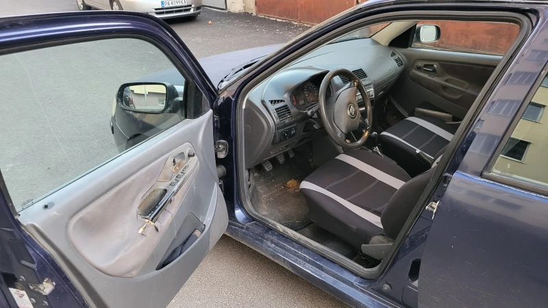Seat Ibiza 1.4i, снимка 5 - Автомобили и джипове - 52257686