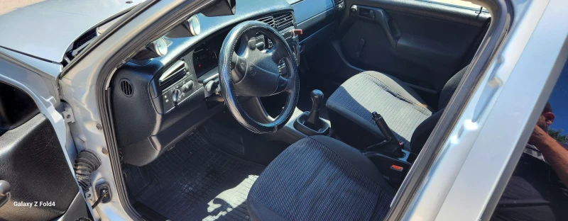 VW Vento, снимка 11 - Автомобили и джипове - 53013788
