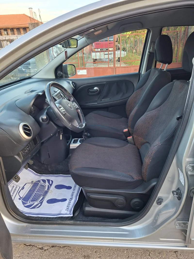 Nissan Note 1.4i 90кс, снимка 11 - Автомобили и джипове - 53129081