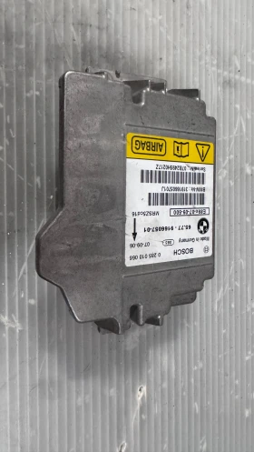     Airbag  /  /  a BMW E90 - 65-77-9166057-01 / 0285010066