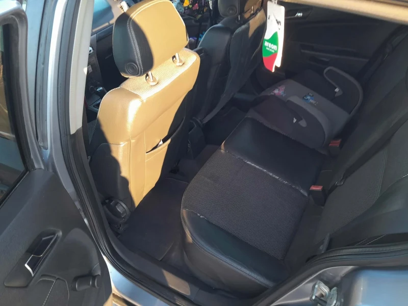 Opel Astra, снимка 9 - Автомобили и джипове - 52900305