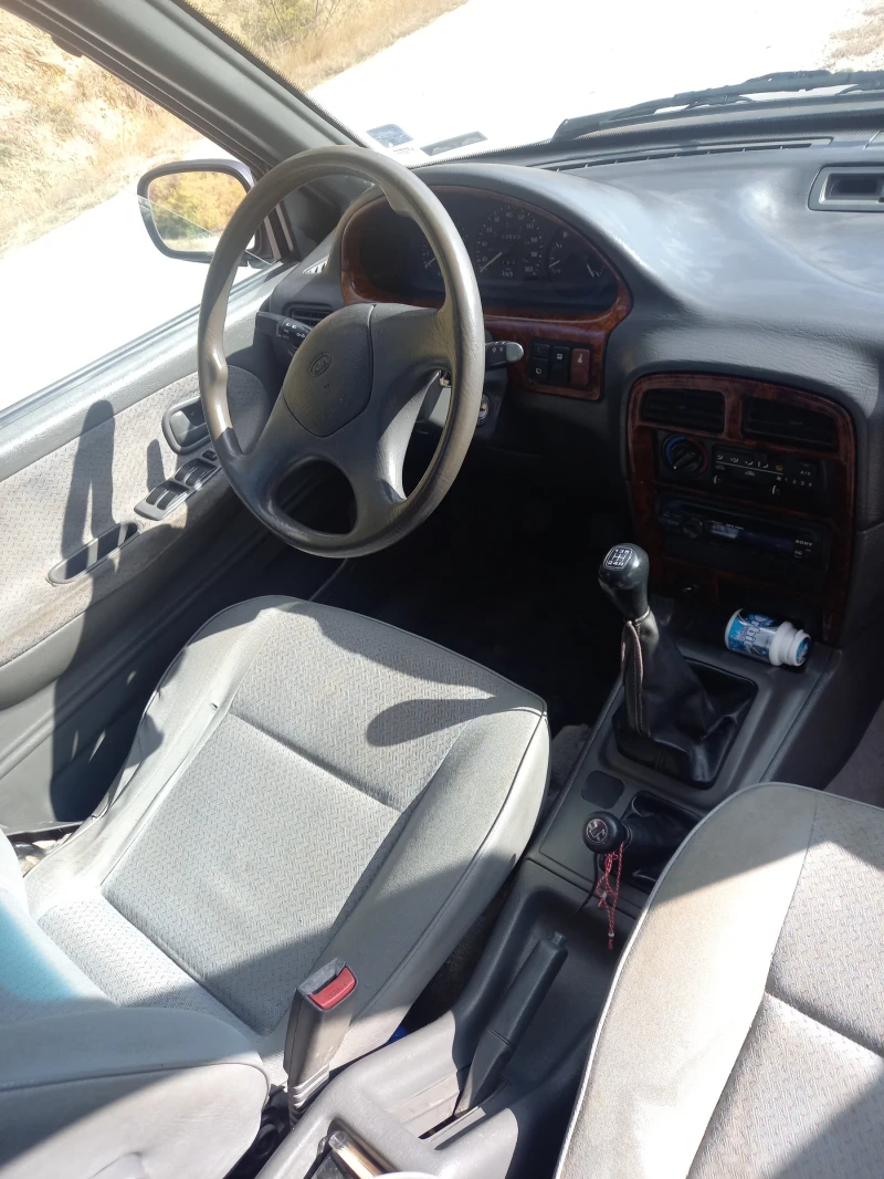 Kia Sportage, снимка 8 - Автомобили и джипове - 52670101