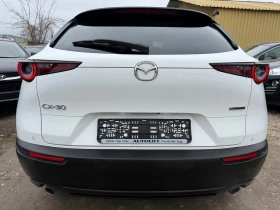 Mazda CX-30 2.0LSkyactiv-G M Hybrid Exclusive Key Less Head Up - 15999 € / 31291.32 лв. - 22897133 6