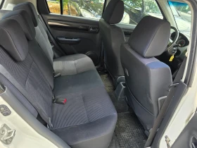 Suzuki Swift 1.3i 90кс. 4х4, снимка 12