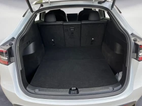 Tesla Model Y LONG-RANGE/514HP/DUAL/AWD/CAM/AMBI/CARPLAY/563f - 64799 лв. - 27061784 7