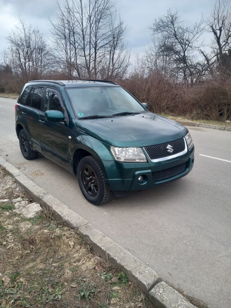 Suzuki Grand vitara 2.0 140 нов внос, снимка 1 - Автомобили и джипове - 49145901