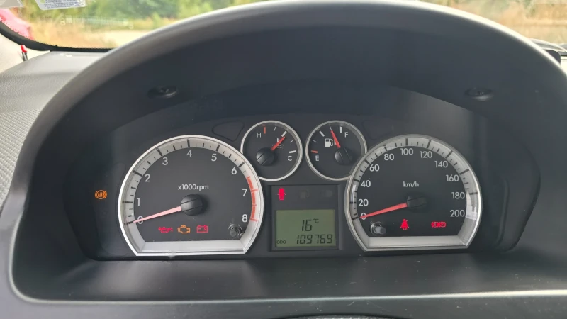 Chevrolet Aveo, снимка 13 - Автомобили и джипове - 53061772