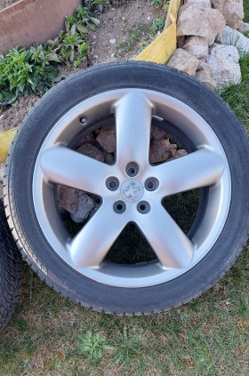����� �� �������� �� ���� � ������ 235/45R18 �� Peugeot 407