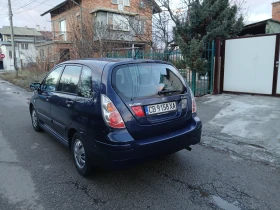 Suzuki Liana 1.4 клима  гаражен , снимка 11