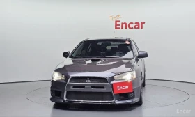 Mitsubishi Lancer * EVOLUTION* CARBON* HEAD-UP* CAMERA* RECARO*  | Auto.bg — изображение 3