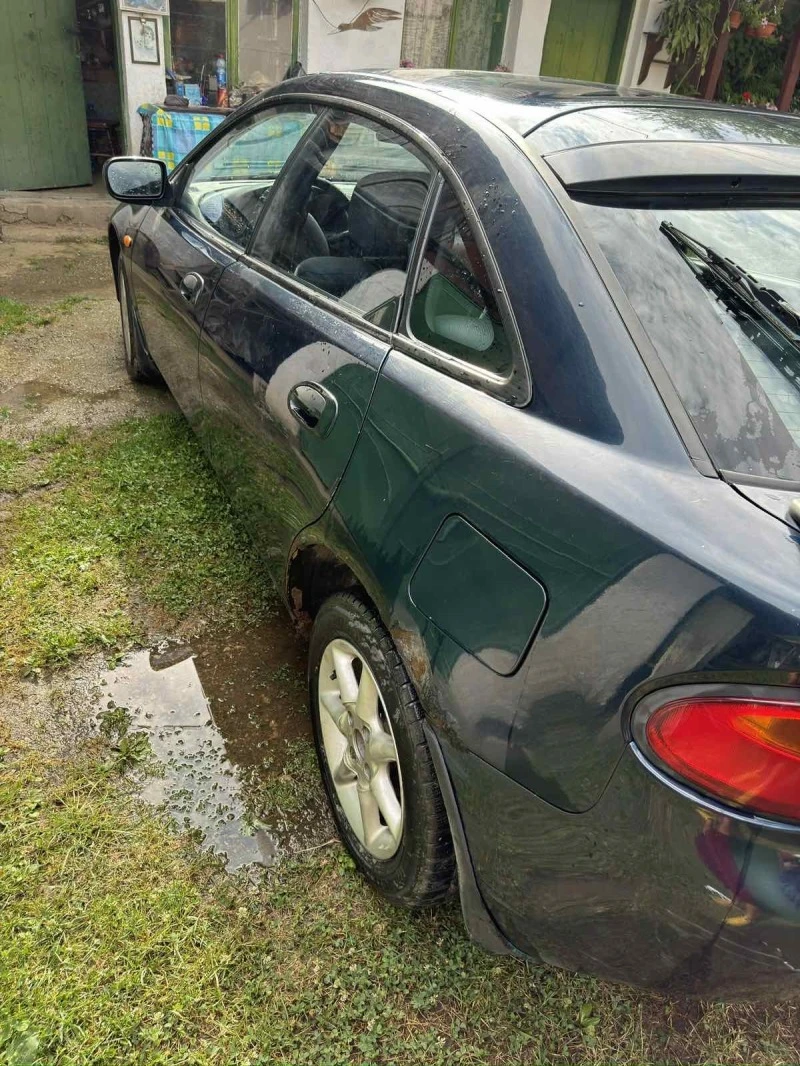 Mazda 323, снимка 2 - Автомобили и джипове - 47972607