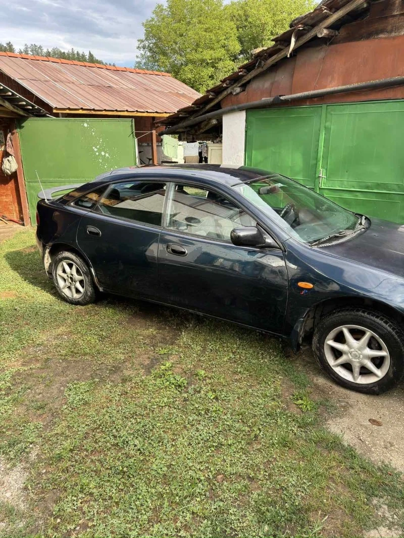 Mazda 323, снимка 10 - Автомобили и джипове - 47972607