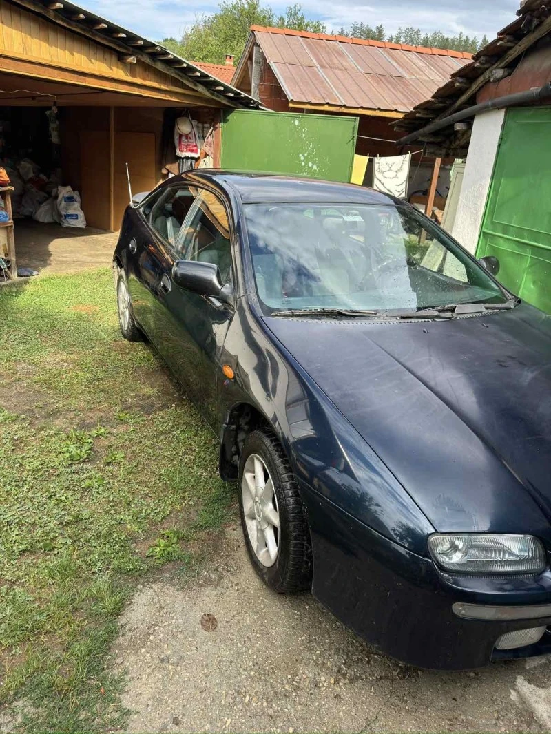 Mazda 323, снимка 9 - Автомобили и джипове - 47972607