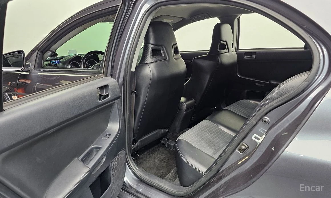 Mitsubishi Lancer * EVOLUTION* CARBON* HEAD-UP* CAMERA* RECARO* , снимка 10 - Автомобили и джипове - 53907021