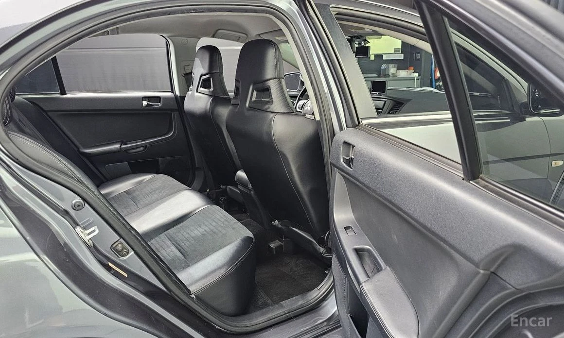 Mitsubishi Lancer * EVOLUTION* CARBON* HEAD-UP* CAMERA* RECARO* , снимка 12 - Автомобили и джипове - 53907021