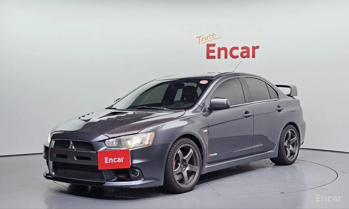 Mitsubishi Lancer * EVOLUTION* CARBON* HEAD-UP* CAMERA* RECARO*  | Auto.bg — изображение 1