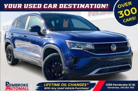 ������ VW Taos
