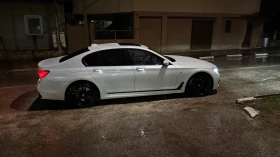 BMW 750, снимка 13