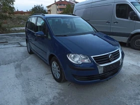 VW Touran 1.9 TDI 7 МЕСТА ПОДГРЯВАНЕ НА СЕДАЛКИТЕ НАВИГАЦИЯ, снимка 2