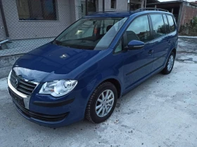 VW Touran 1.9 TDI 7 МЕСТА ПОДГРЯВАНЕ НА СЕДАЛКИТЕ НАВИГАЦИЯ, снимка 1