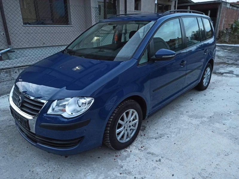 VW Touran 1.9 TDI 7 МЕСТА ПОДГРЯВАНЕ НА СЕДАЛКИТЕ НАВИГАЦИЯ, снимка 1 - Автомобили и джипове - 48668941