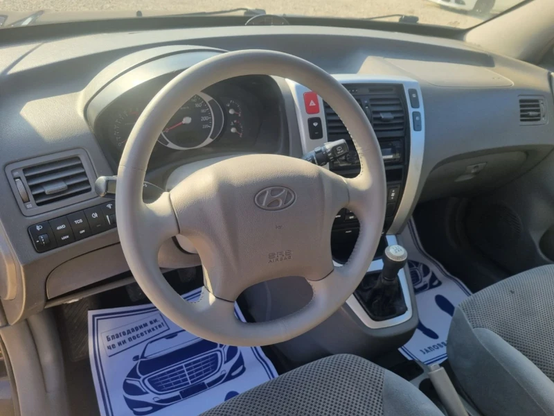 Hyundai Tucson 2.0i  4WD  LPG, снимка 7 - Автомобили и джипове - 48160659