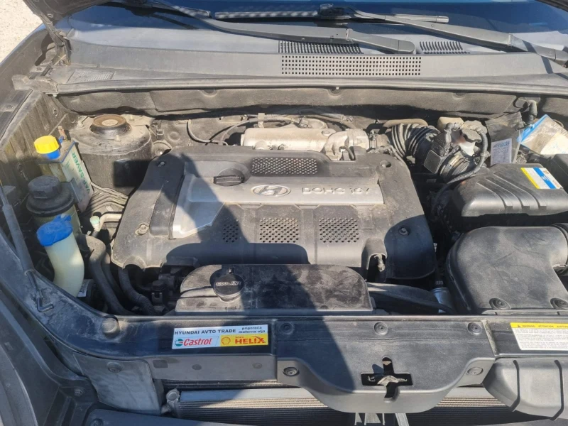 Hyundai Tucson 2.0i  4WD  LPG, снимка 14 - Автомобили и джипове - 48160659