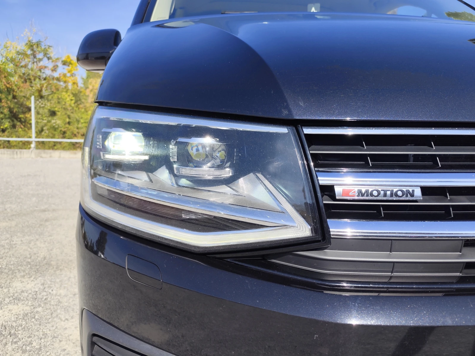 VW Multivan 2.0TDi/4X4/АВТОМАТИК/КОЖА/ПОДГРЕВ/7М /NAVI/CAMERA, снимка 17 - Автомобили и джипове - 56525355