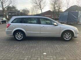 Opel Astra 1.8 Benzin 125 коня, снимка 7