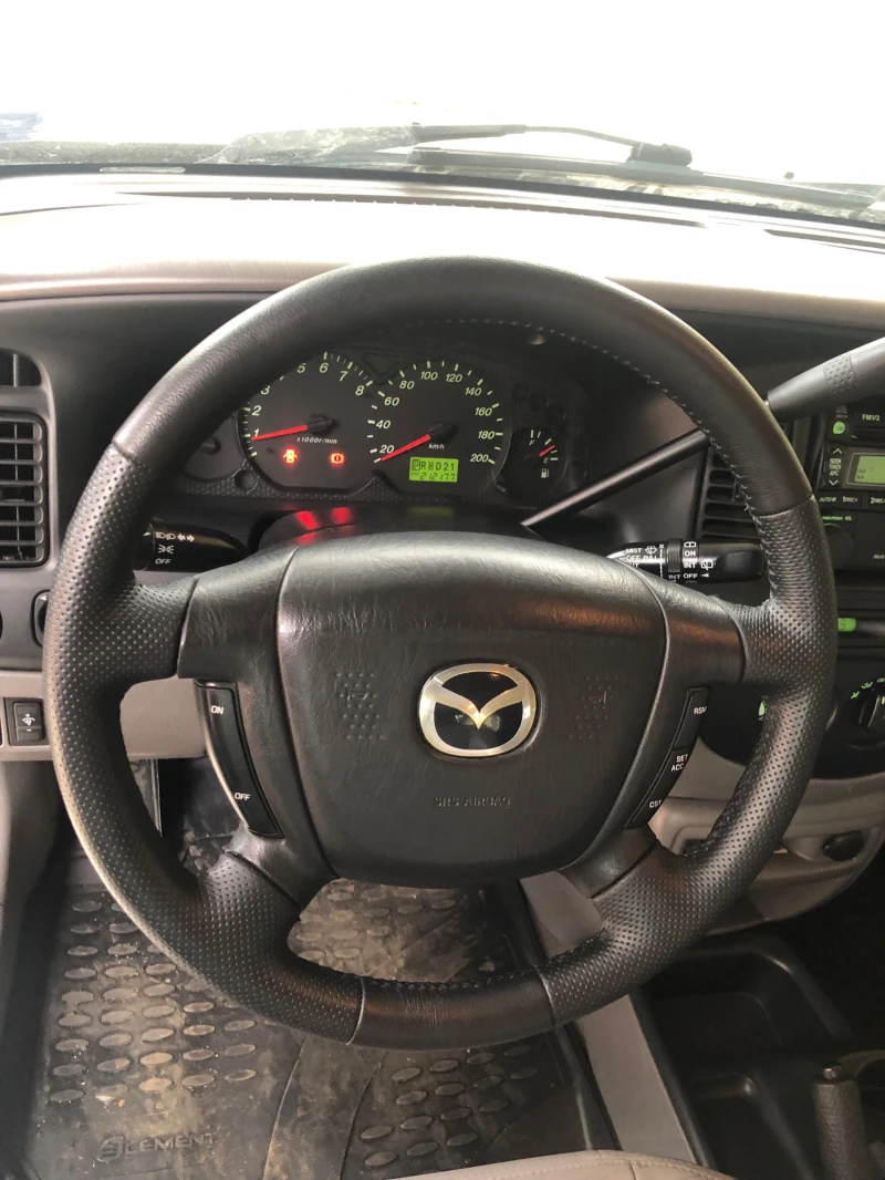 Mazda Tribute 3.0 V6, снимка 9 - Автомобили и джипове - 48417482