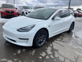 ������ Tesla Model 3